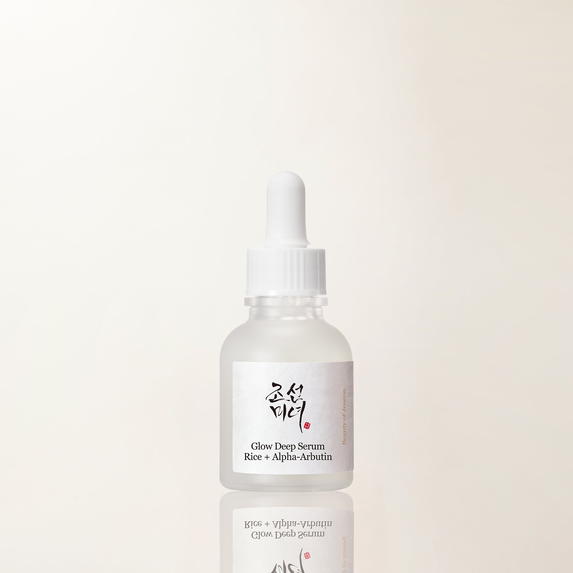 a white bottle with a dropper