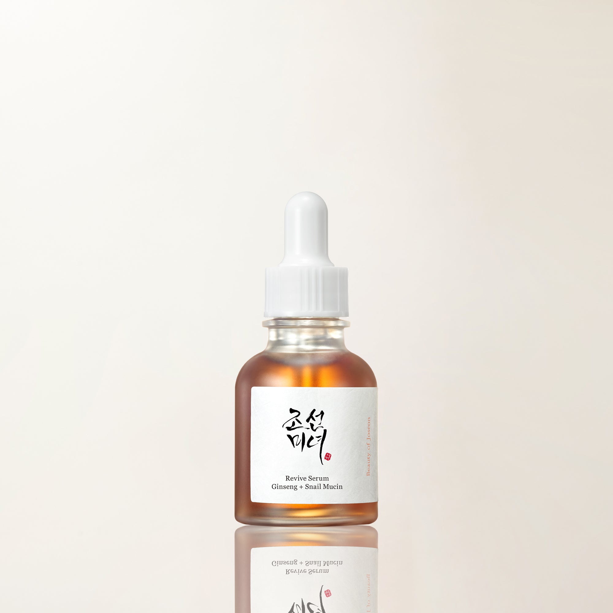 a bottle of liquid with a dropper
