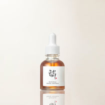 a bottle of liquid with a dropper