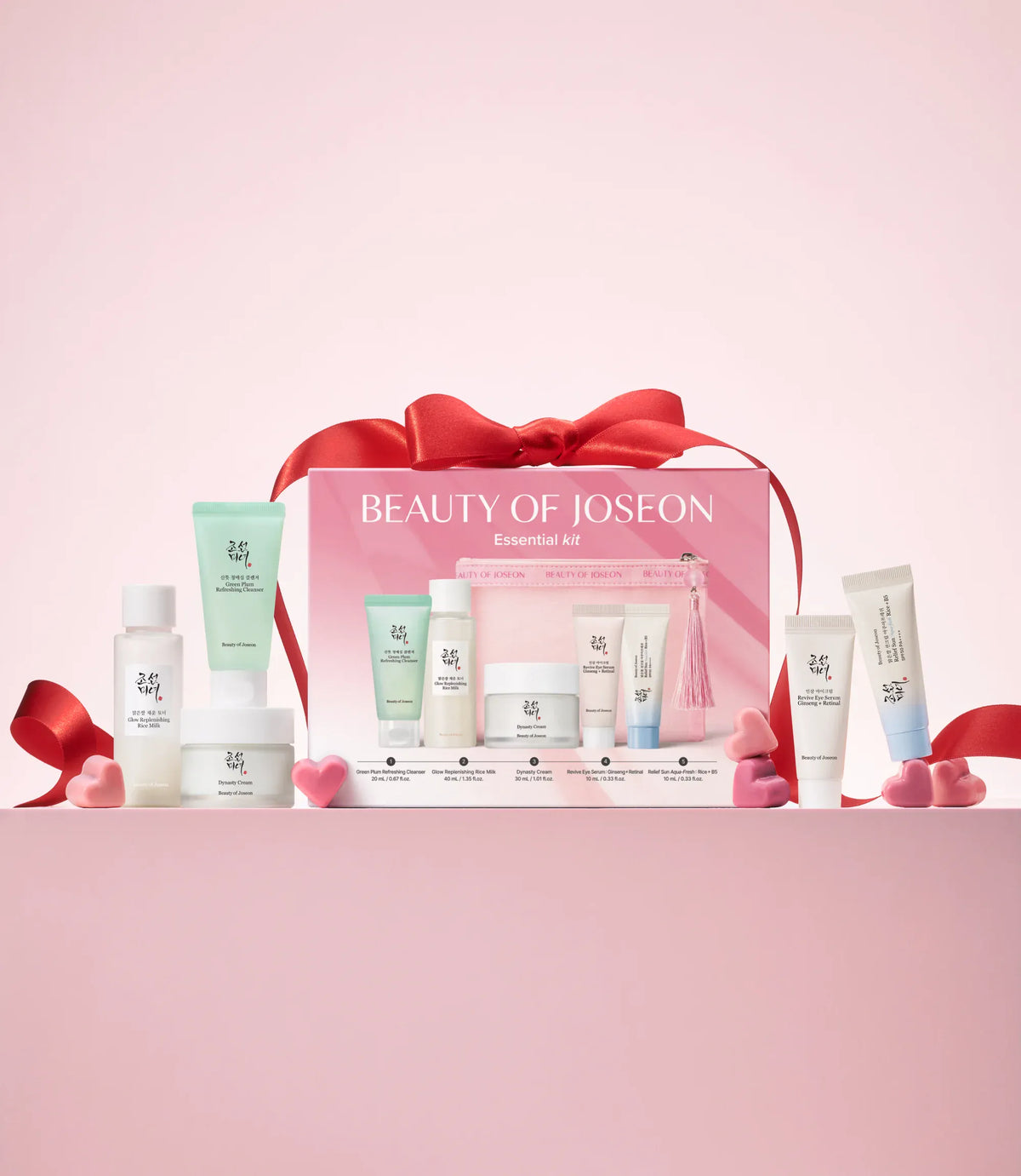 a group of small bottles of cosmetics